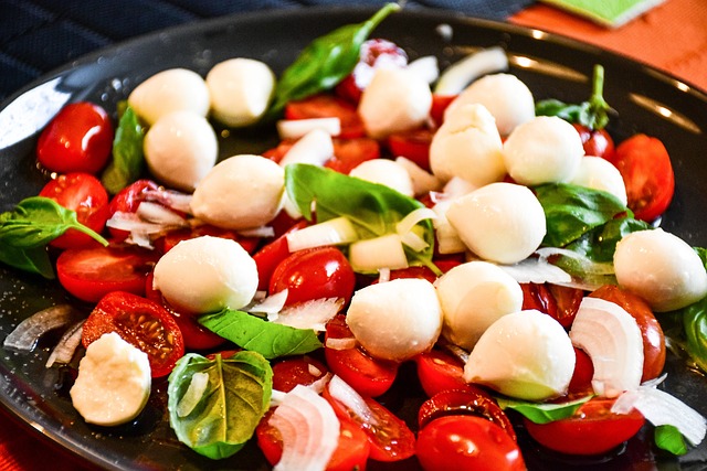 Caprese Salad with tomatoes, basil and fresh mozarella